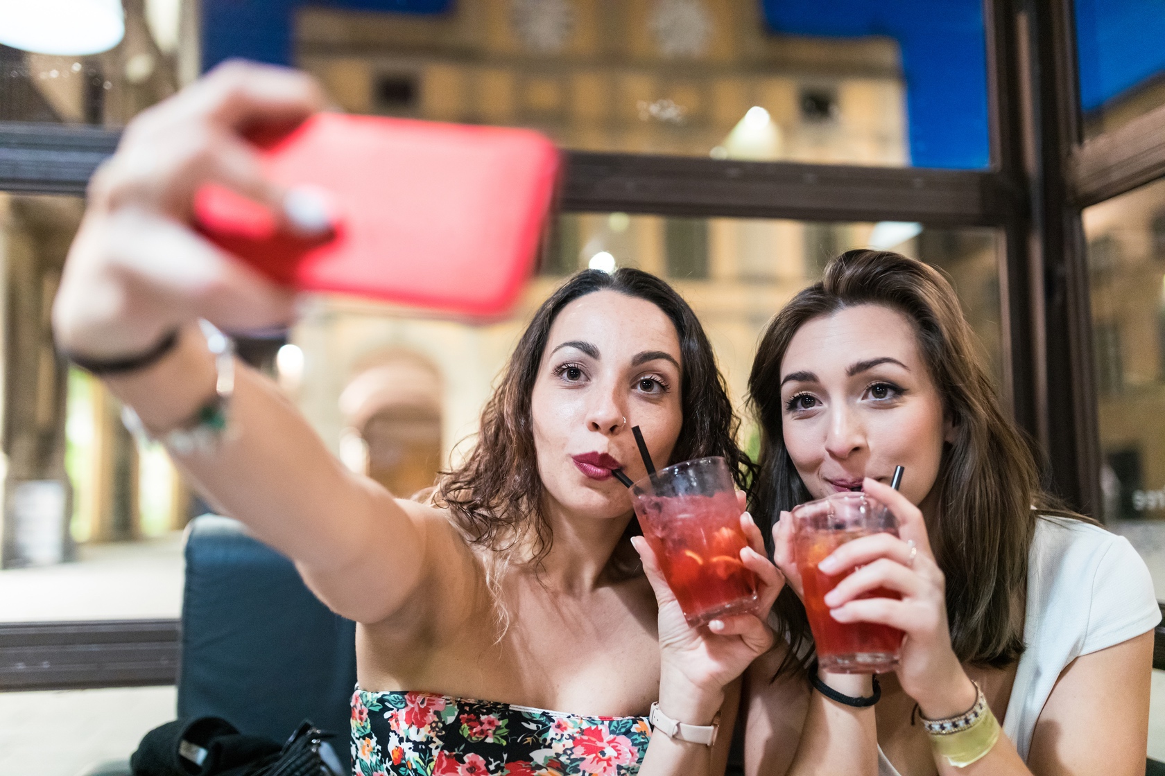 two happy women taking a selfie while enjoying a d 2025 01 08 02 43 28 utc Whatzup
